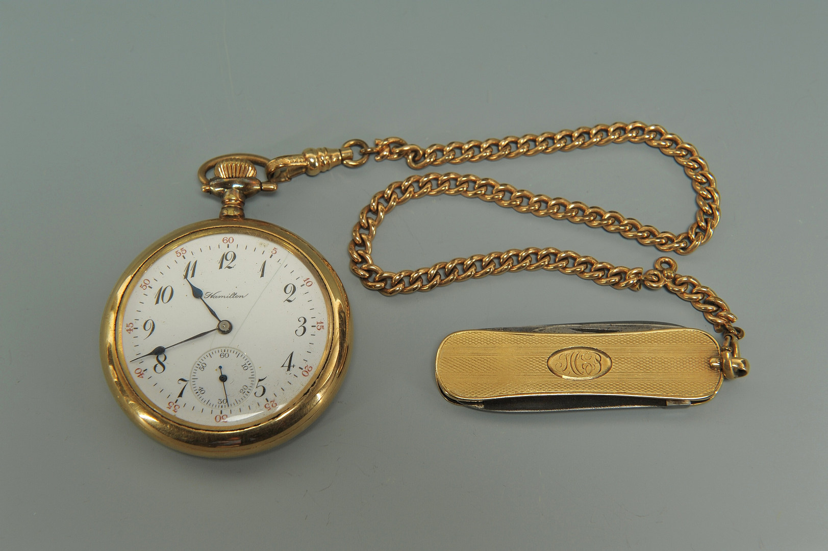 Lot 415: Four pocket watches and a knife1623 x 1080