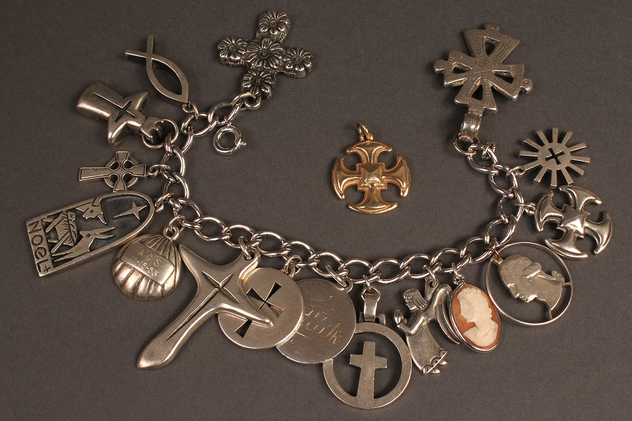 16 with bracelet Avery charms, charm  james  avery marked  James bracelet many silver charm cross sterling