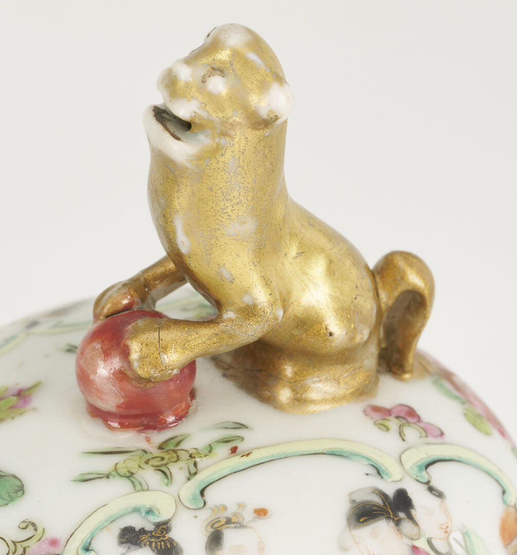 Lot 732: Pair of Chinese Rose Medallion Lidded Urns, Foo Dog Handles