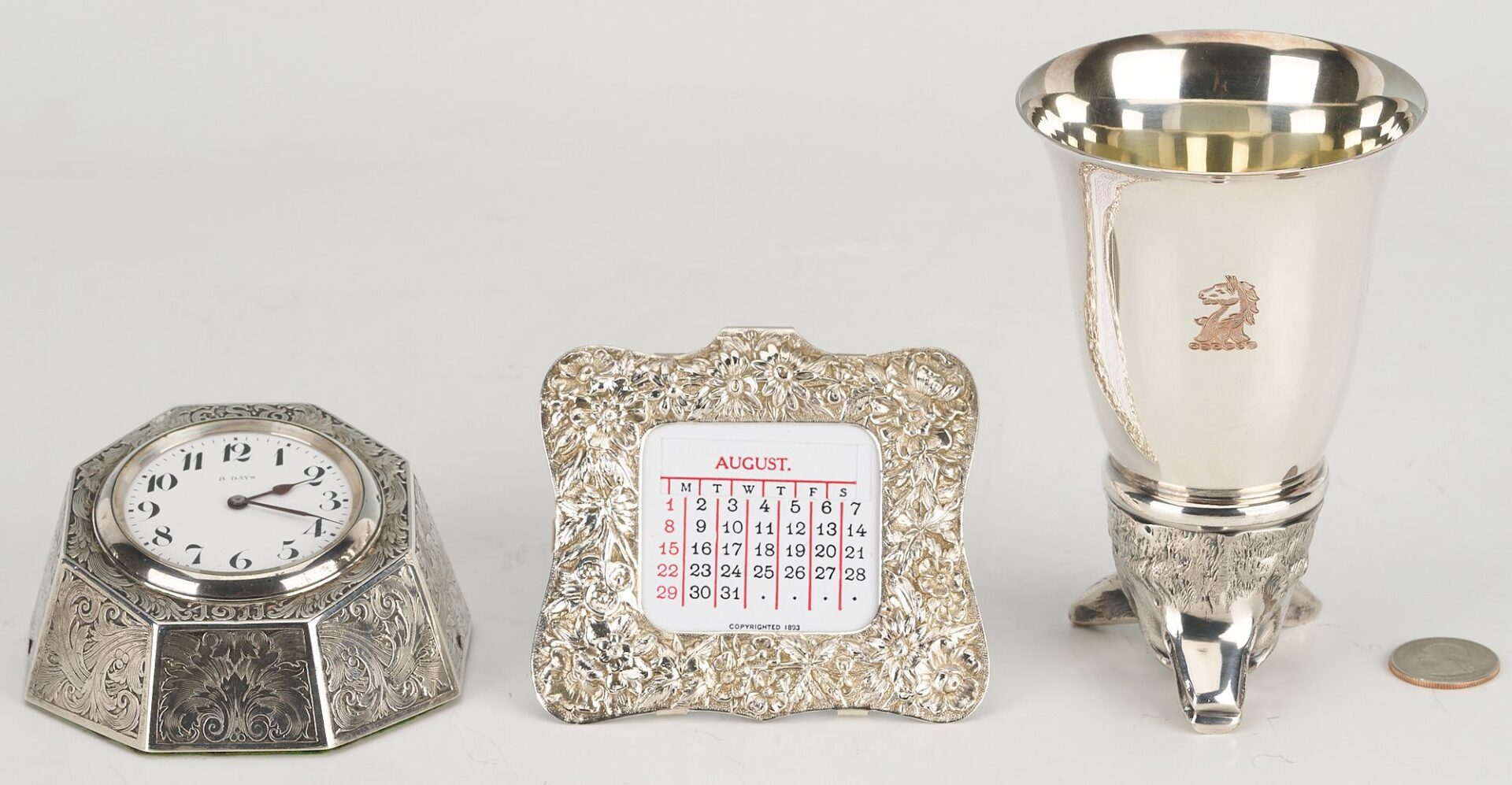 Lot 1146: 3 Silver Novelty Items: Clock, Stirrup Cup, Calendar