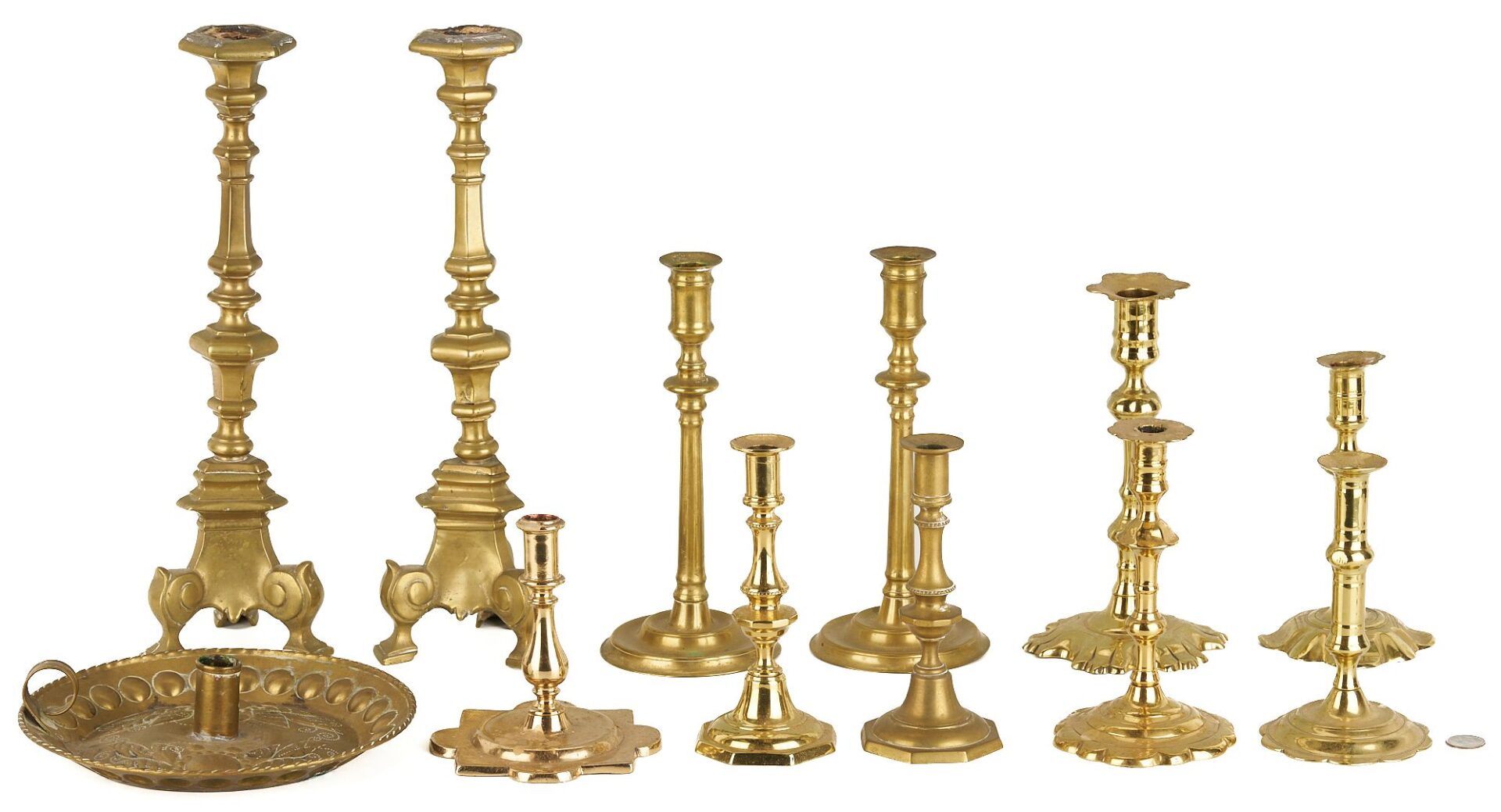 Lot 204: Collection of 12 early Brass Candlesticks