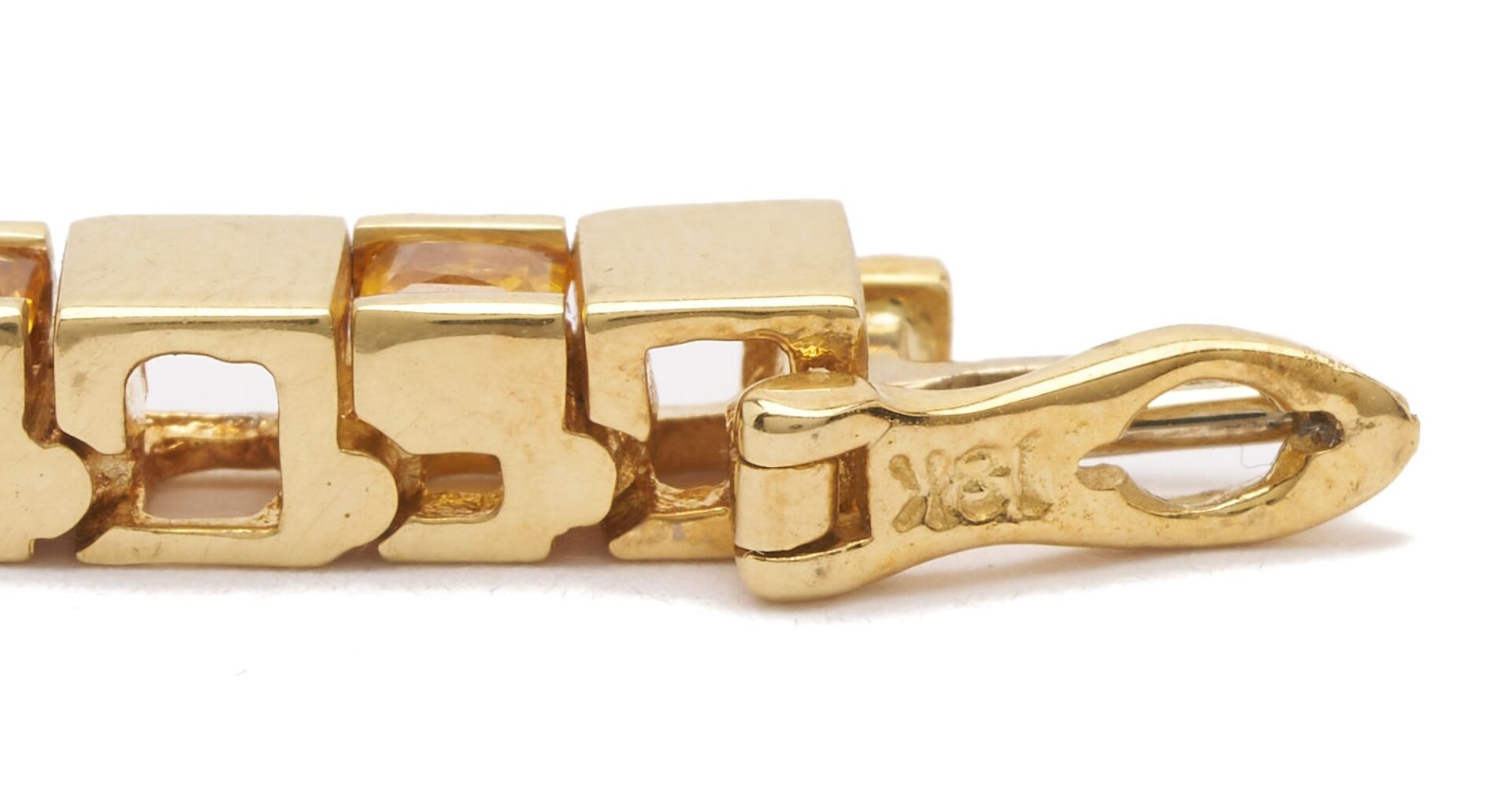 Lot 299: 18K Gold and Gemstone Tennis Bracelet