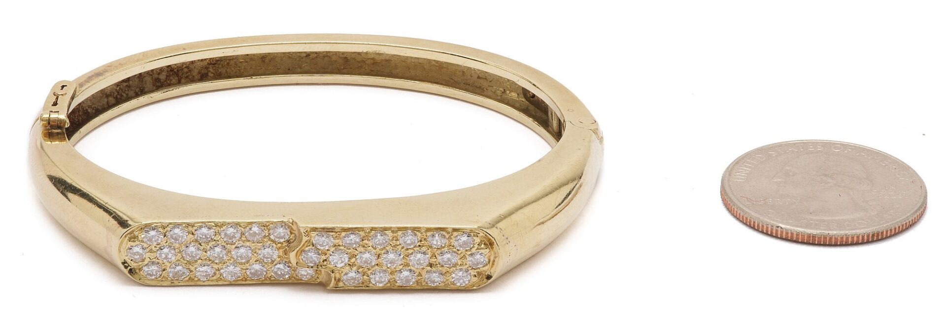 Lot 304: 14K Gold and Diamond Bangle Bracelet