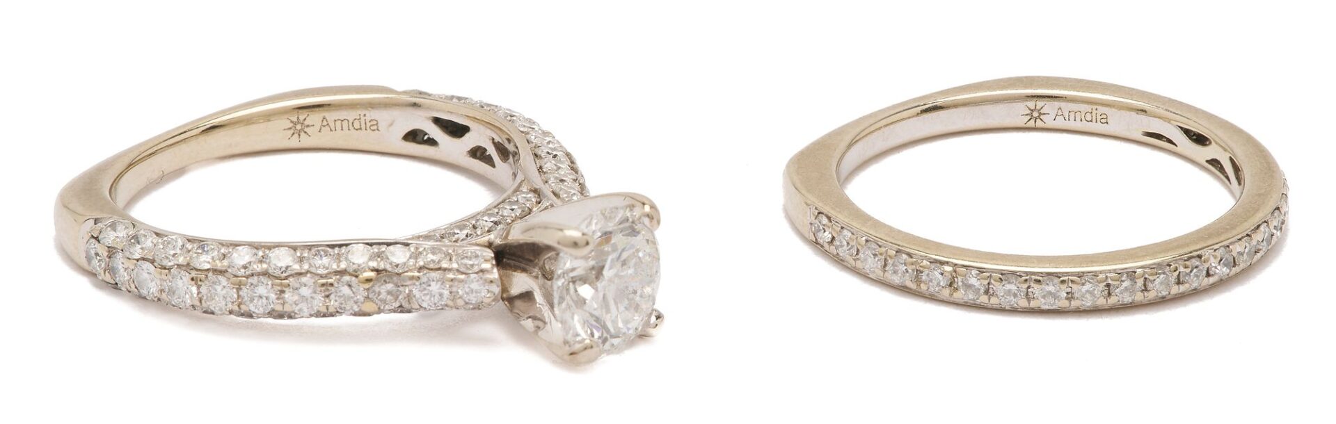 Lot 308: Platinum & 18K Gold Diamond Wedding Set