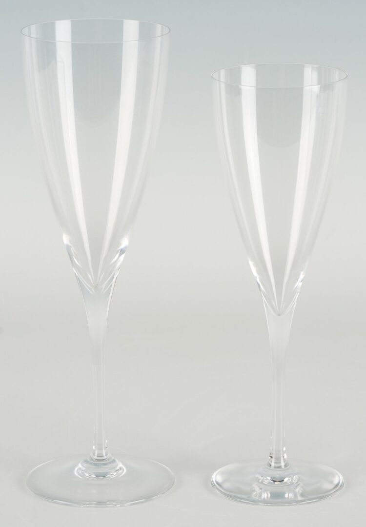 Lot 352: 19 Baccarat Dom Perignon Crystal Glasses & 1 Tiffany Champagne Flute