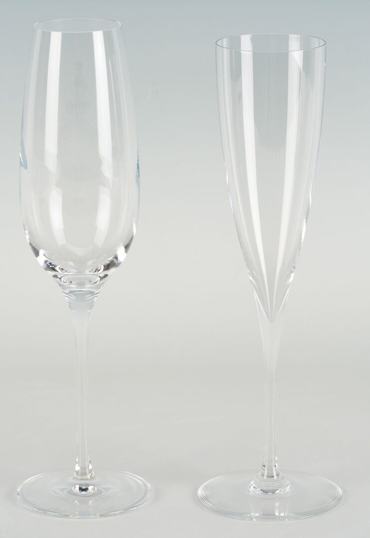 Lot 352: 19 Baccarat Dom Perignon Crystal Glasses & 1 Tiffany Champagne Flute