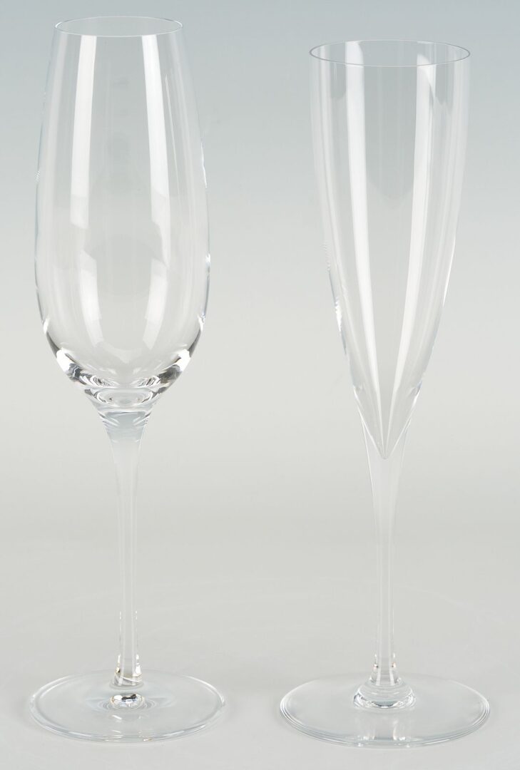 Lot 352: 19 Baccarat Dom Perignon Crystal Glasses & 1 Tiffany Champagne Flute