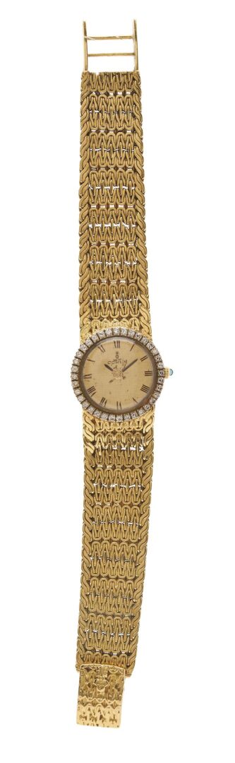 Lot 52: 18K Gold Corum Watch