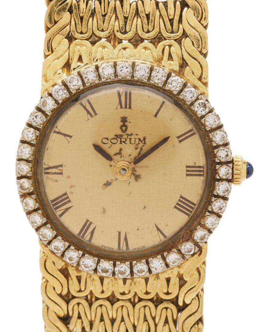 Lot 52: 18K Gold Corum Watch