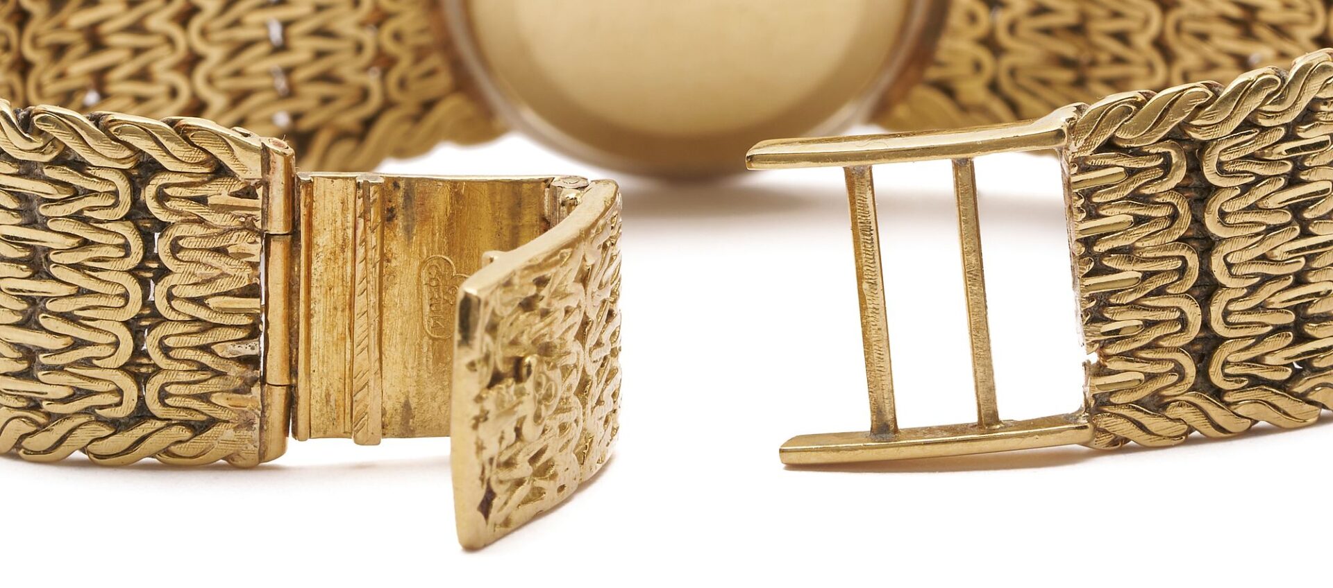 Lot 52: 18K Gold Corum Watch