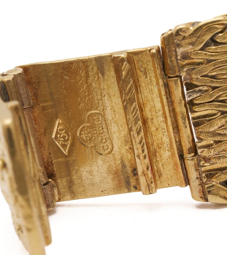 Lot 52: 18K Gold Corum Watch