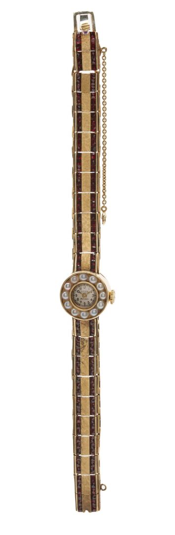 Lot 612: Lucien Piccard Gold and Pearl Watch Face w/ Gold and Ruby Band