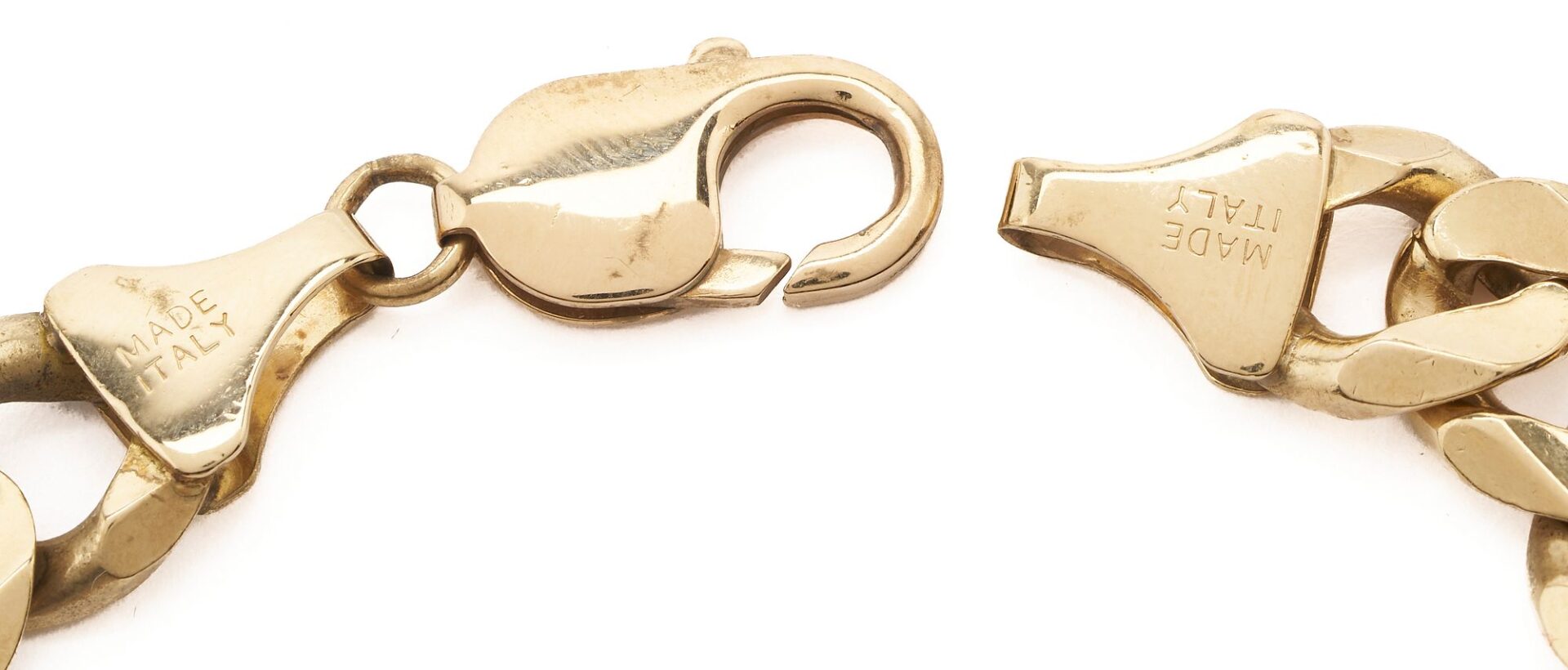 Lot 614: 10K Gold Figaro Style Chain Bracelet