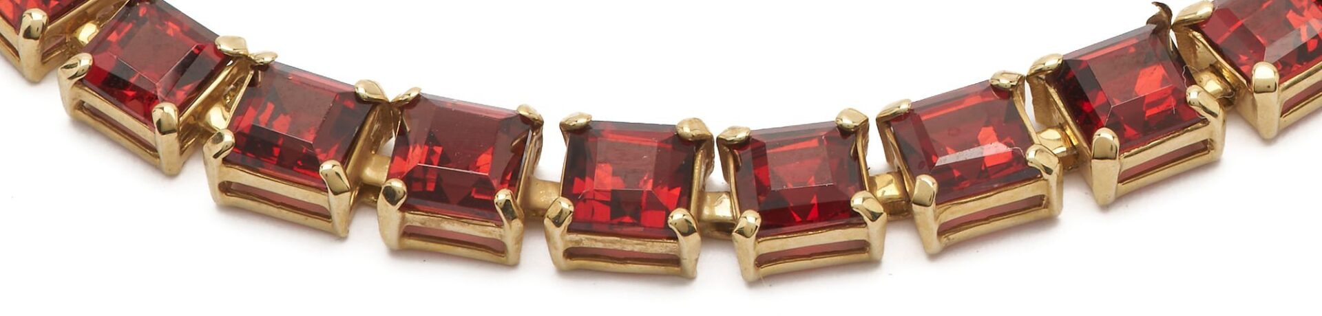 Lot 640: Three (3) 14K Gold Gemstone Bracelets