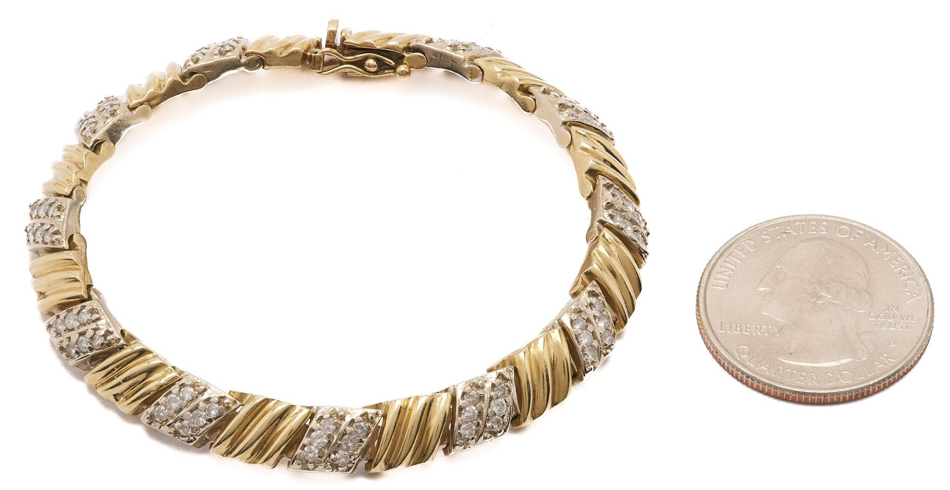Lot 642: 14K Gold & Diamond Link Bracelet w/ Extra Link