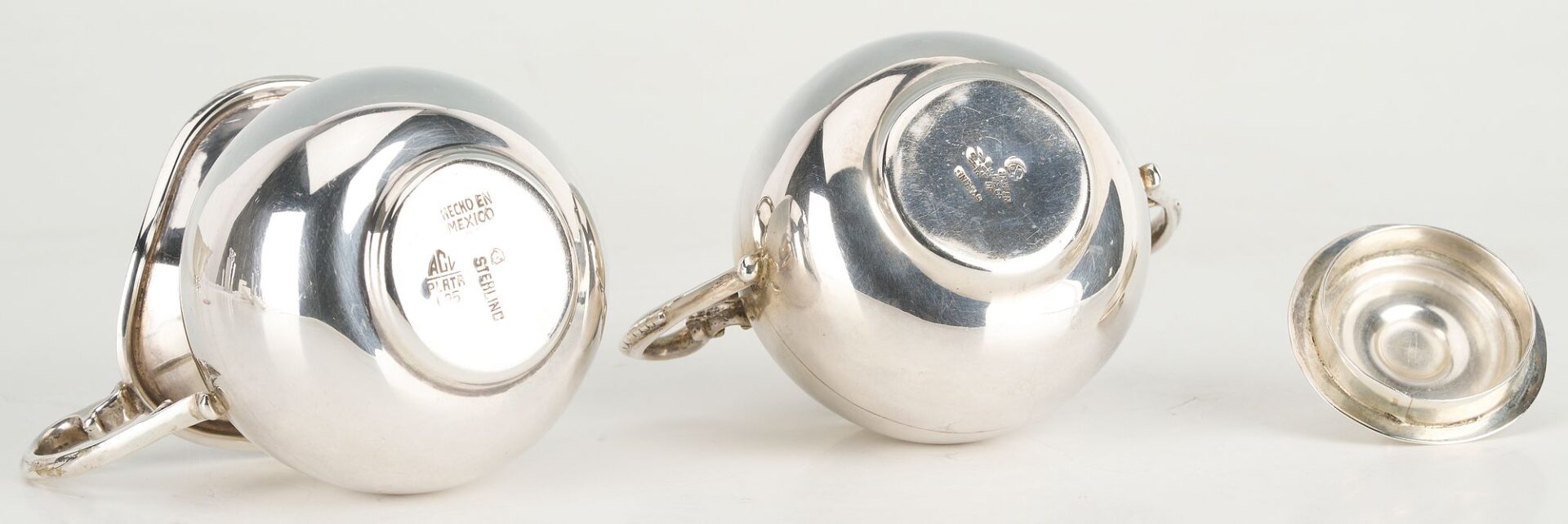 Lot 657: 6 pcs Hollowware incl. Danish Modern Spoons, Mexican Sugar/Creamer Set, Revere Bowl