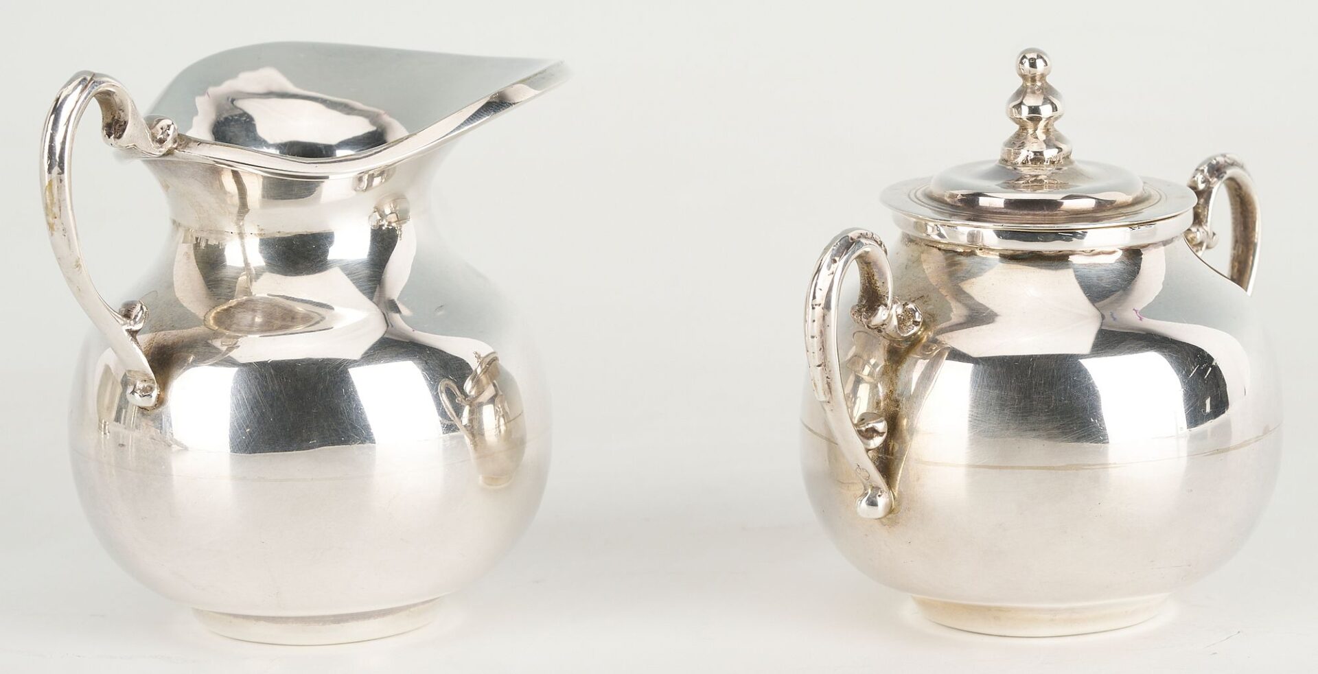 Lot 657: 6 pcs Hollowware incl. Danish Modern Spoons, Mexican Sugar/Creamer Set, Revere Bowl