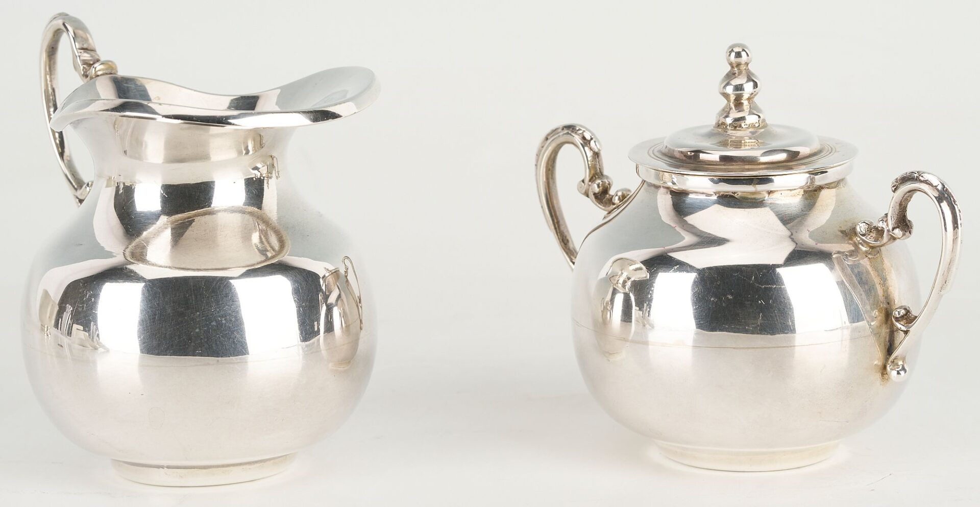 Lot 657: 6 pcs Hollowware incl. Danish Modern Spoons, Mexican Sugar/Creamer Set, Revere Bowl