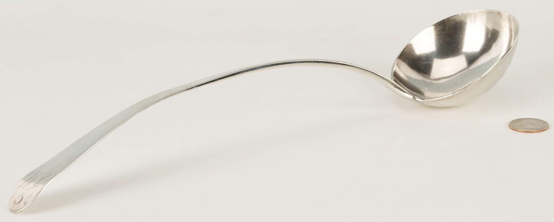 Lot 73: VA coin silver ladle, James or John Adam