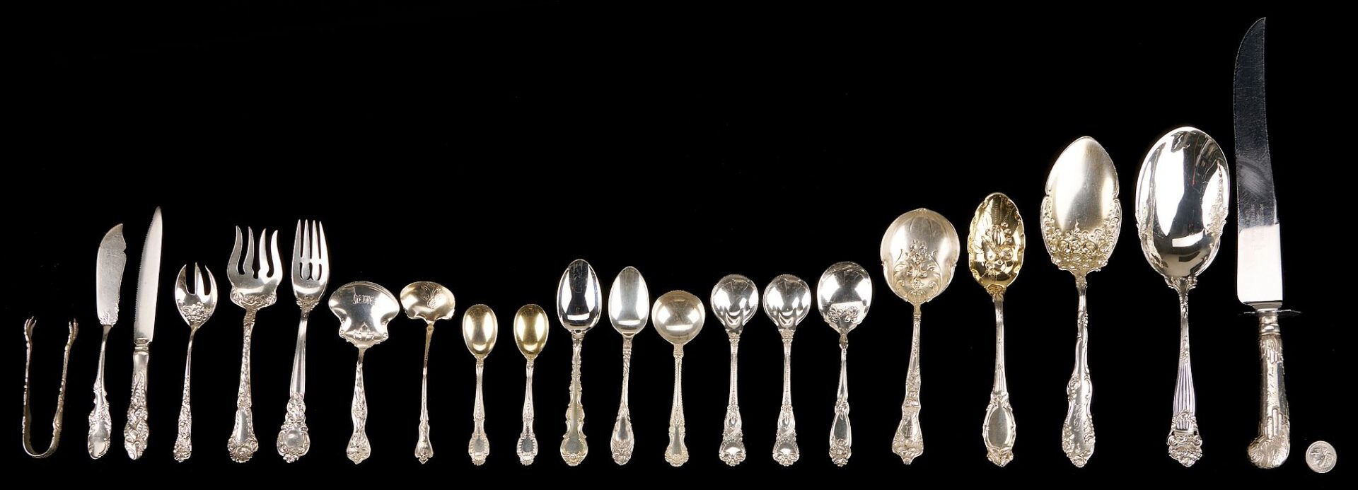 Lot 857: 21 Assorted Sterling Silver Flatware Pieces