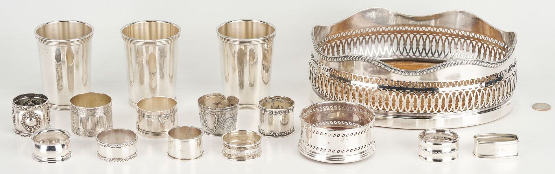 Lot 862: 16 pcs Hollowware including Juleps, Napkin Rings, Wine Coaster
