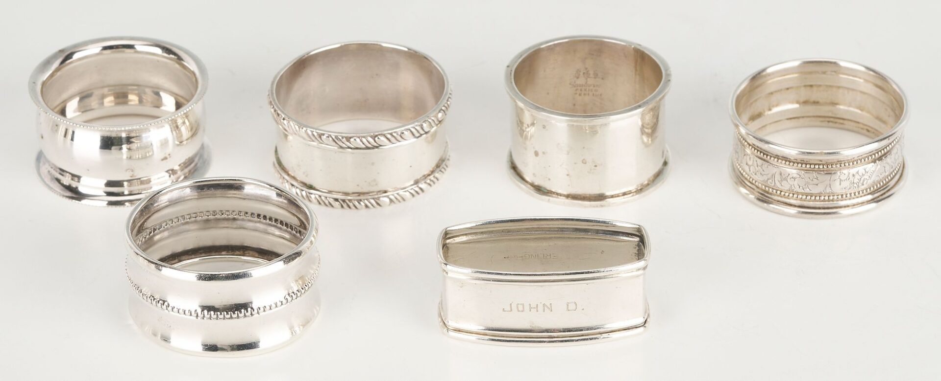 Lot 862: 16 pcs Hollowware including Juleps, Napkin Rings, Wine Coaster