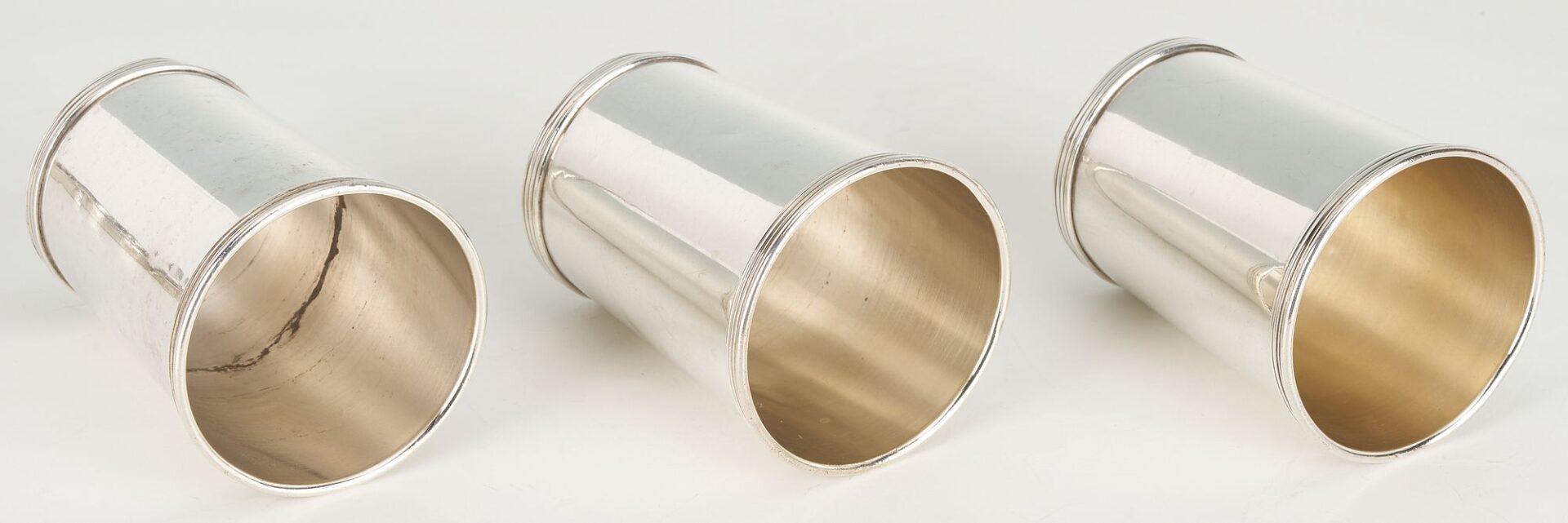 Lot 862: 16 pcs Hollowware including Juleps, Napkin Rings, Wine Coaster