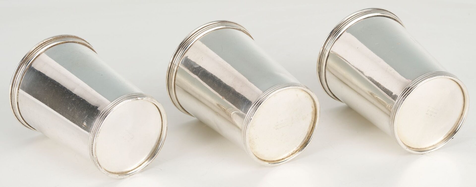 Lot 862: 16 pcs Hollowware including Juleps, Napkin Rings, Wine Coaster