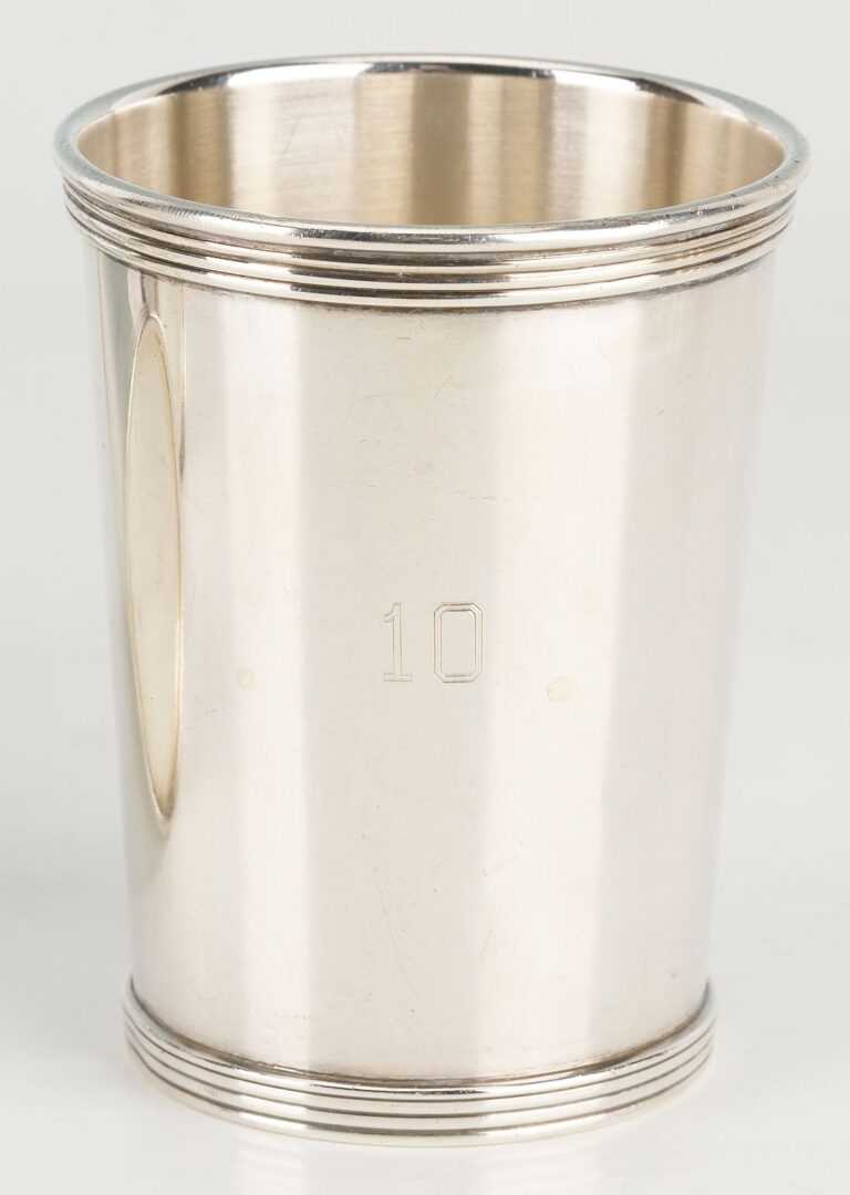 Lot 862: 16 pcs Hollowware including Juleps, Napkin Rings, Wine Coaster