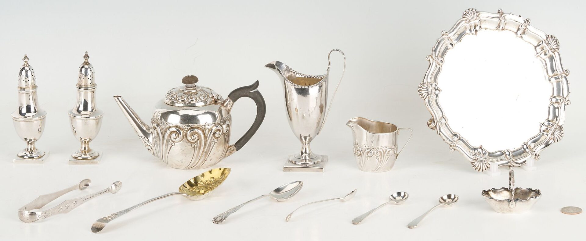 Lot 871: Assd. British Silver including Teapot, 2 creamers, cased Salt and Pepper