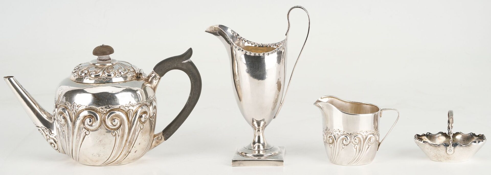 Lot 871: Assd. British Silver including Teapot, 2 creamers, cased Salt and Pepper
