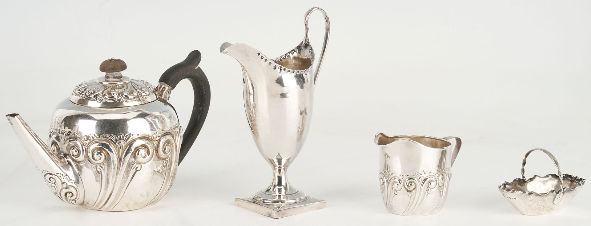 Lot 871: Assd. British Silver including Teapot, 2 creamers, cased Salt and Pepper
