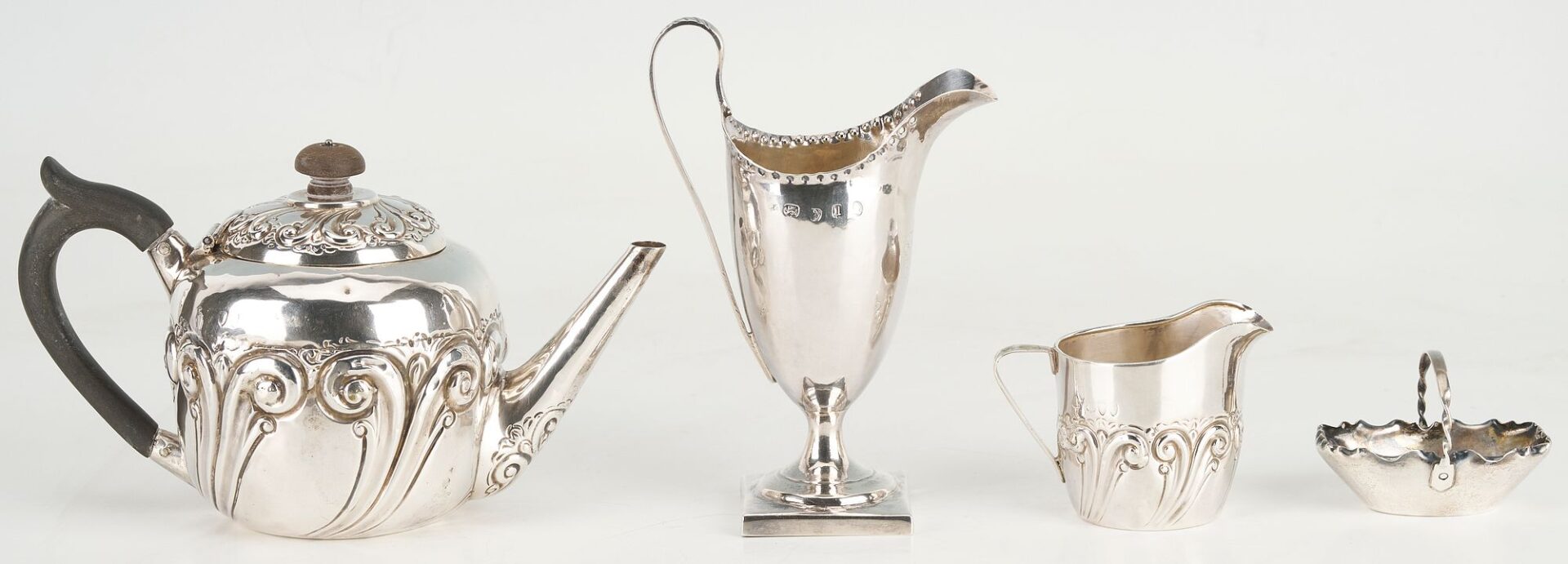 Lot 871: Assd. British Silver including Teapot, 2 creamers, cased Salt and Pepper