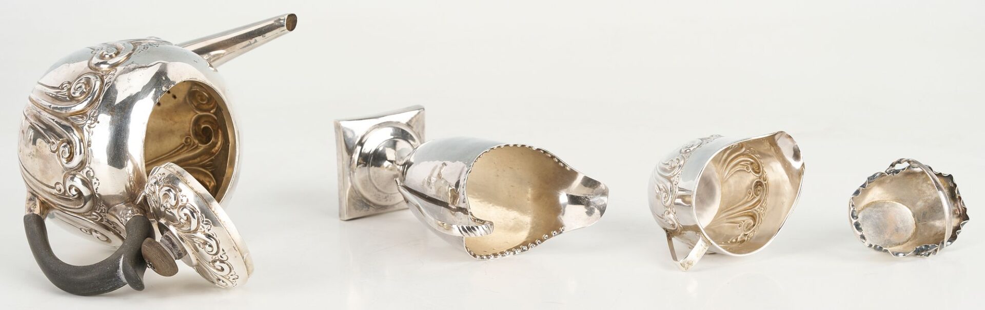 Lot 871: Assd. British Silver including Teapot, 2 creamers, cased Salt and Pepper