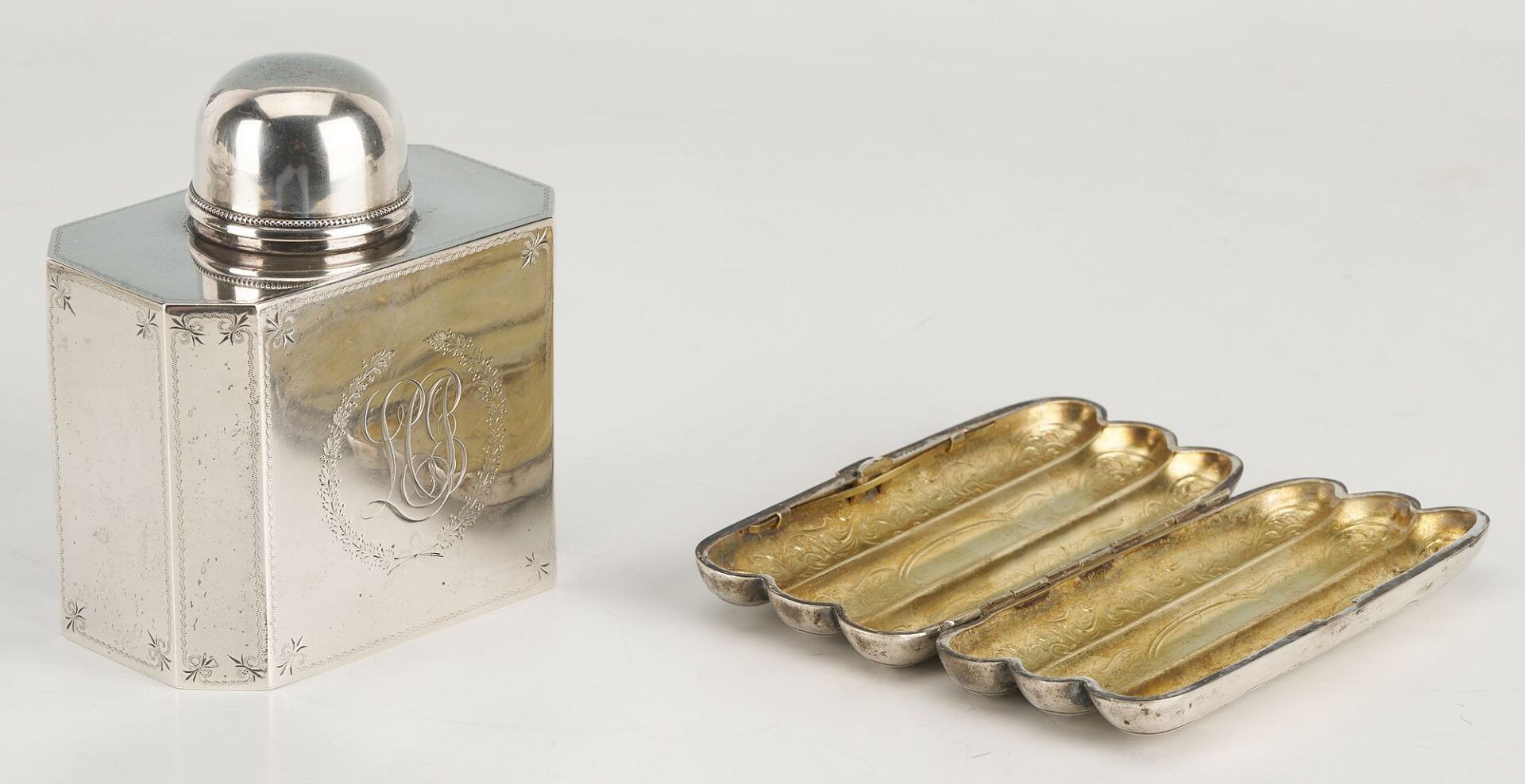 Lot 874: 10 Silver items incl. Tea Caddy, Larding Needles, Cigar Case, Brooches
