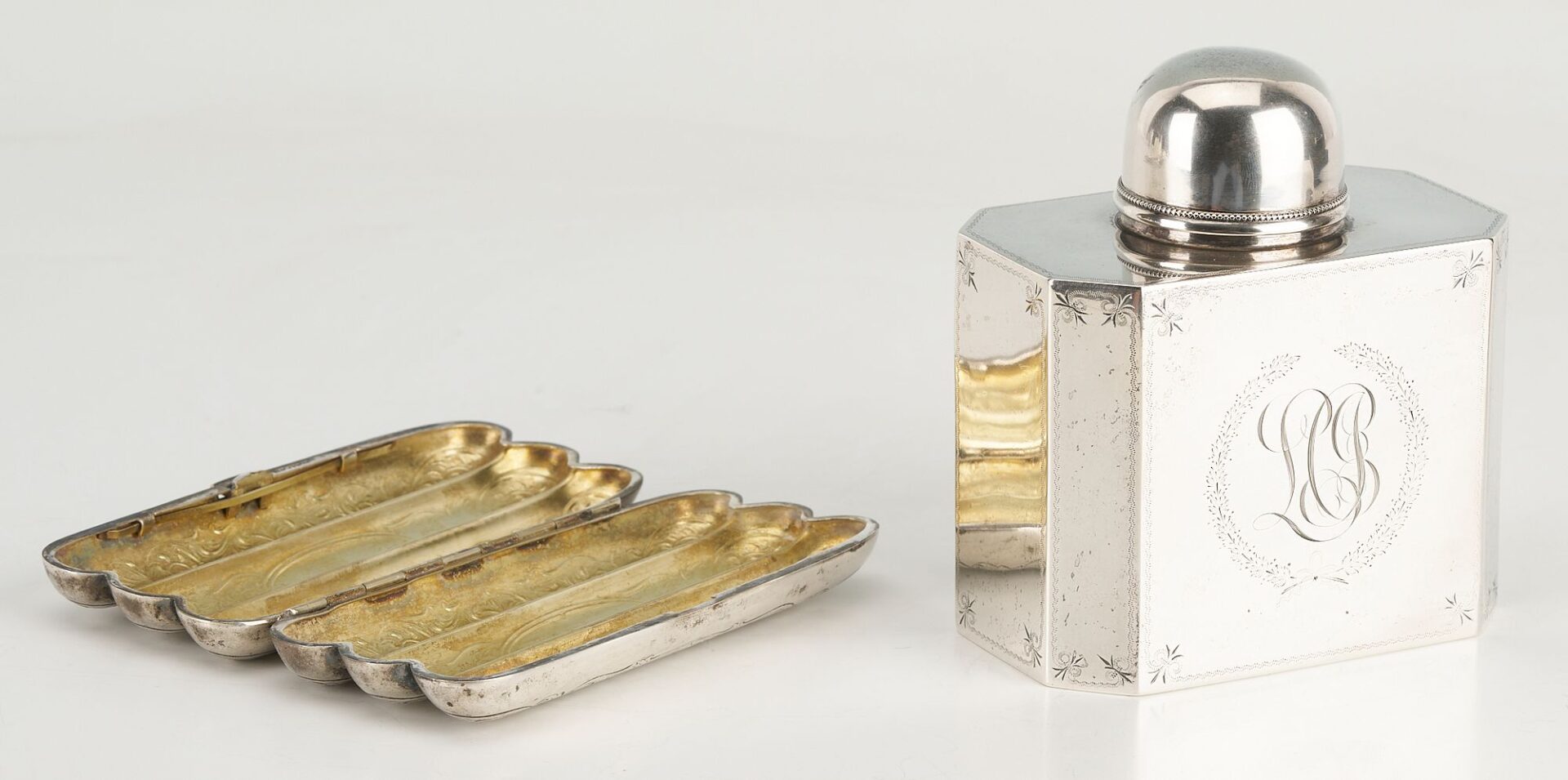 Lot 874: 10 Silver items incl. Tea Caddy, Larding Needles, Cigar Case, Brooches