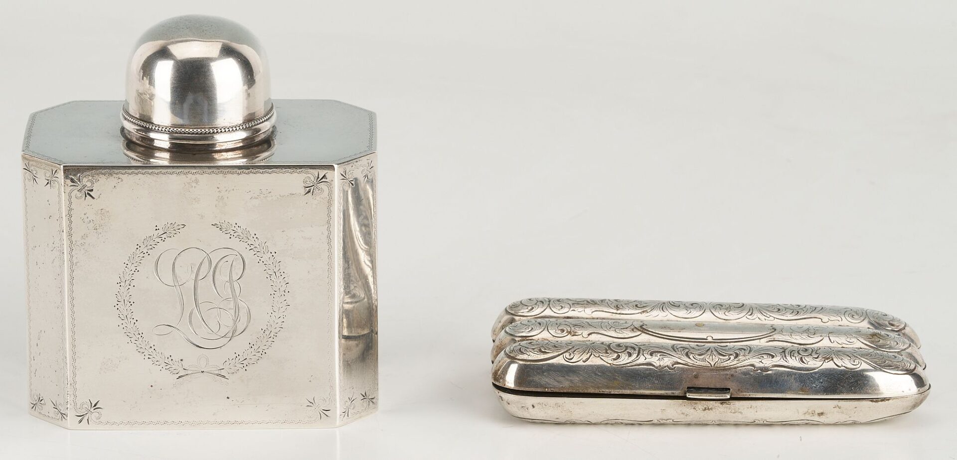 Lot 874: 10 Silver items incl. Tea Caddy, Larding Needles, Cigar Case, Brooches