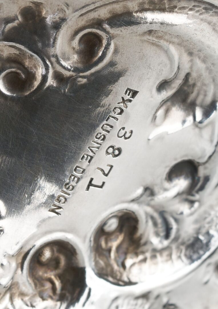 Lot 90: Large Howard & Company Sterling Repousse Pitcher