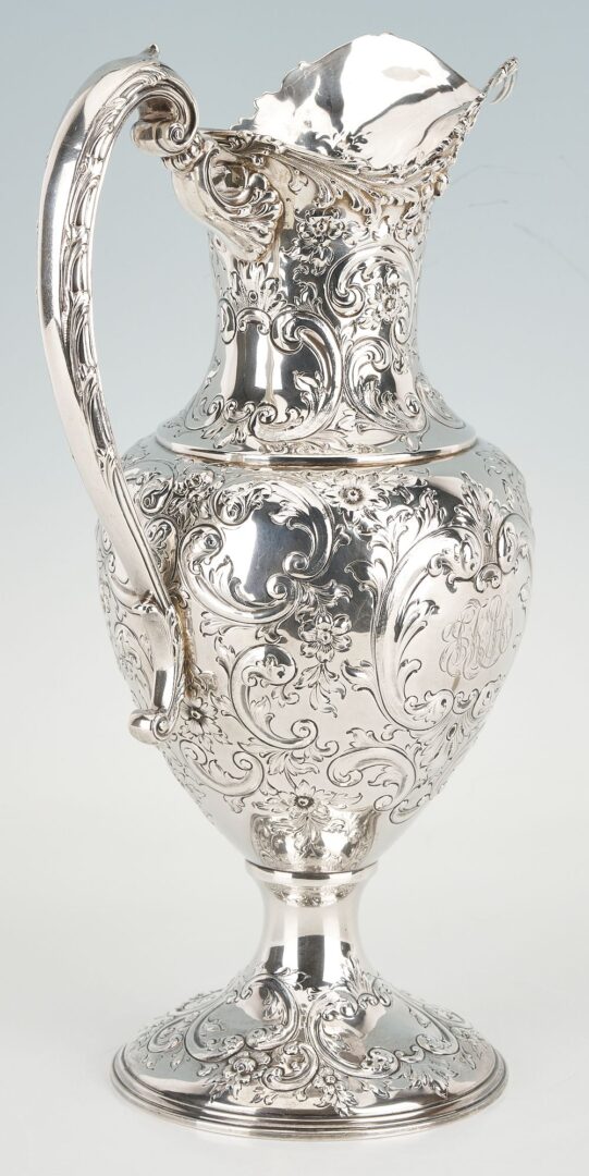 Lot 90: Large Howard & Company Sterling Repousse Pitcher
