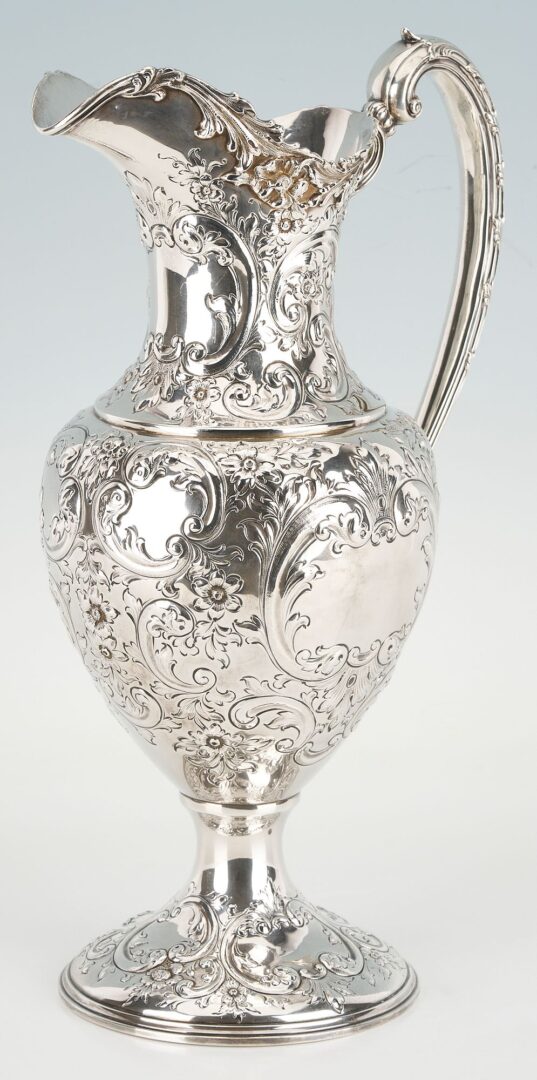 Lot 90: Large Howard & Company Sterling Repousse Pitcher