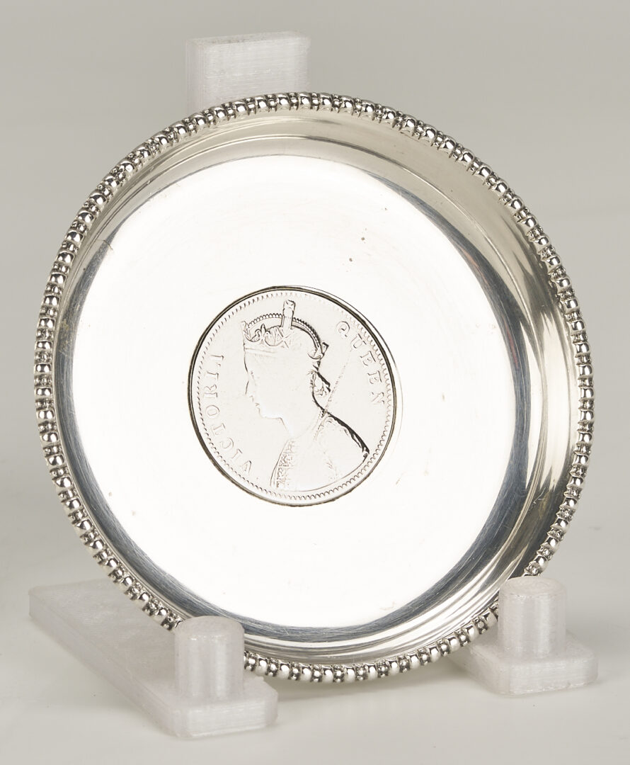 Lot 1015: 6 Sterling Silver Bread Plates & 4 Queen Victoria/King George Rupee Silver Coasters