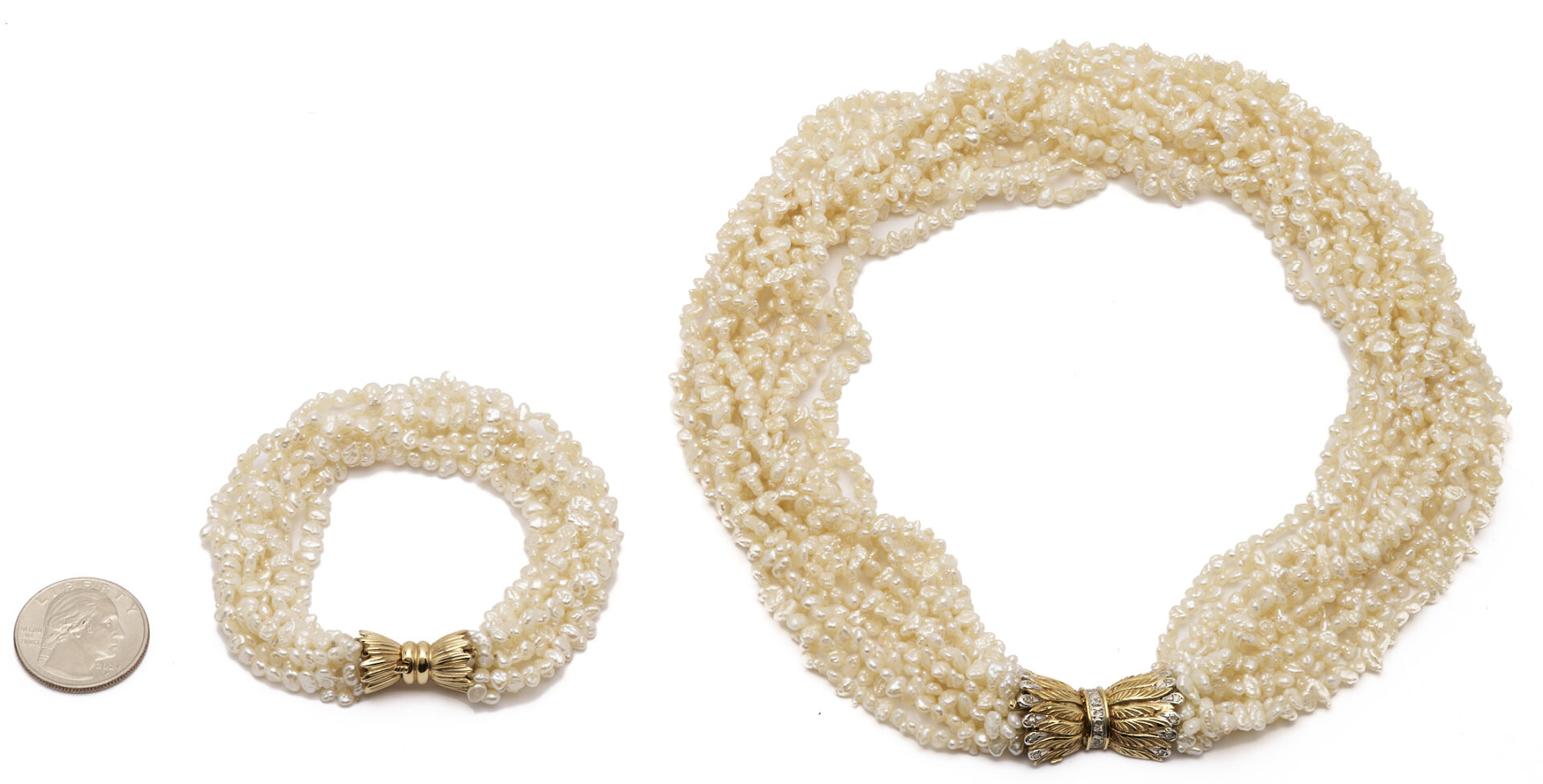 Lot 1186: Multi Strand Freshwater Pearl Necklace & Bracelet