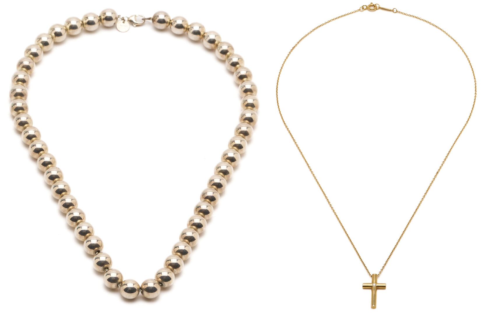 Lot 1195: 2 Tiffany & Company Necklaces, 18K Gold & Sterling Silver