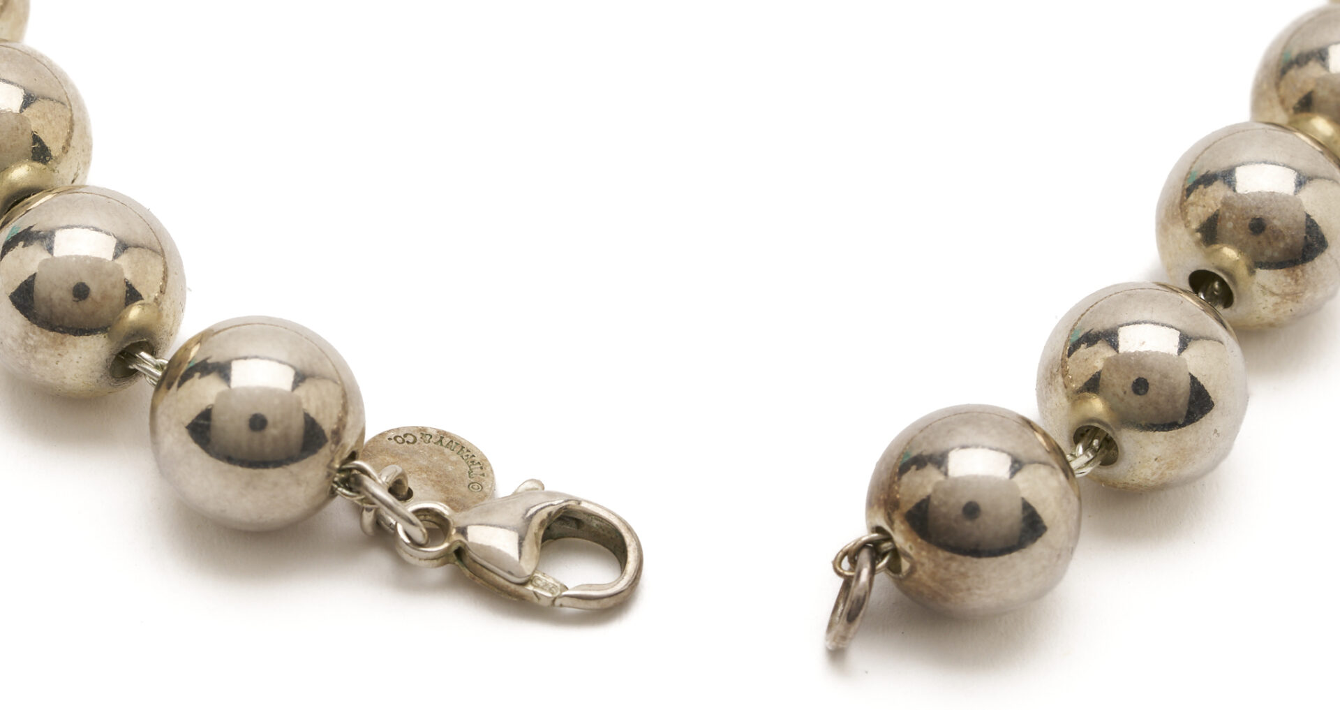 Lot 1195: 2 Tiffany & Company Necklaces, 18K Gold & Sterling Silver