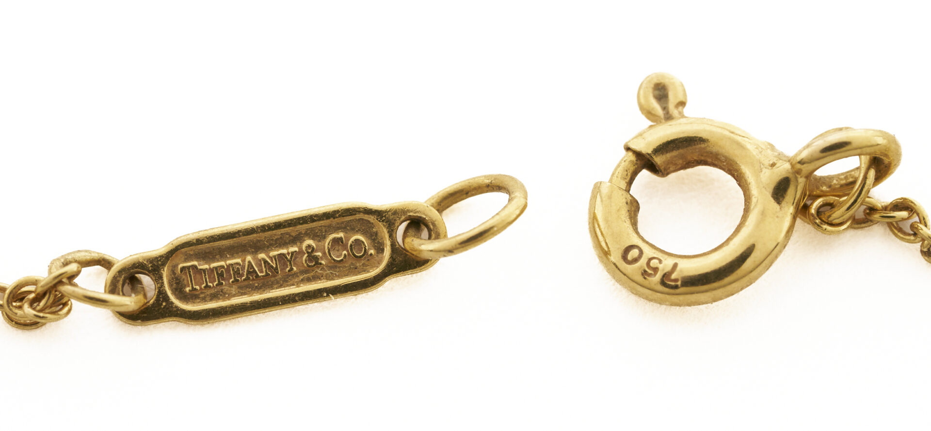 Lot 1195: 2 Tiffany & Company Necklaces, 18K Gold & Sterling Silver
