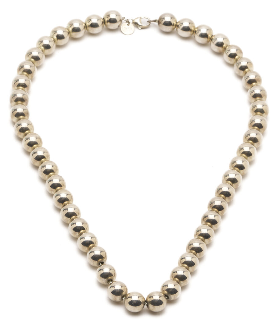 Lot 1195: 2 Tiffany & Company Necklaces, 18K Gold & Sterling Silver