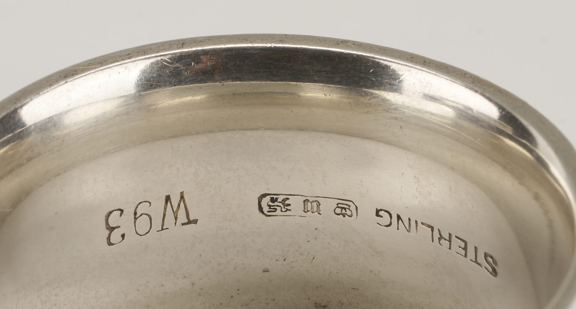 Lot 1202: Gorham Mixed Metal Serving Spoon plus 9 Sterling Napkin Rings