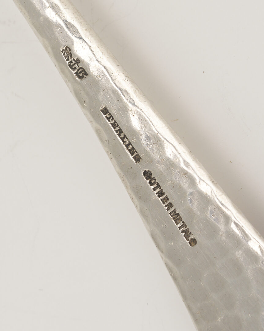 Lot 1202: Gorham Mixed Metal Serving Spoon plus 9 Sterling Napkin Rings