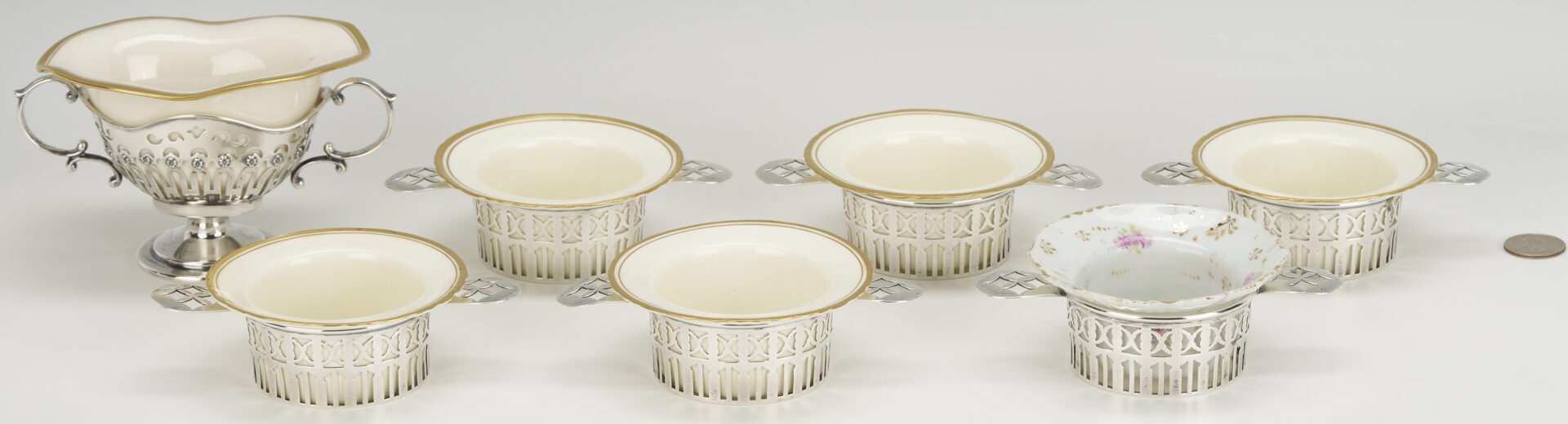 Lot 1211: 6 Sterling Silver Ramekin Frames plus 1 sterling soup cup