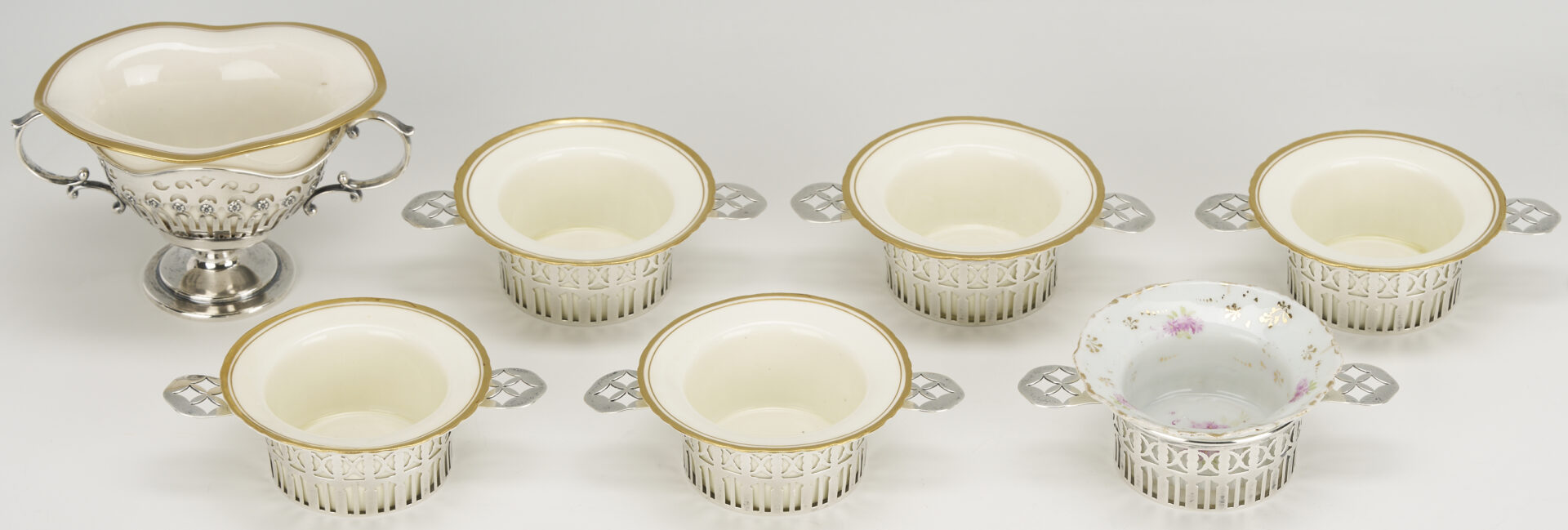 Lot 1211: 6 Sterling Silver Ramekin Frames plus 1 sterling soup cup